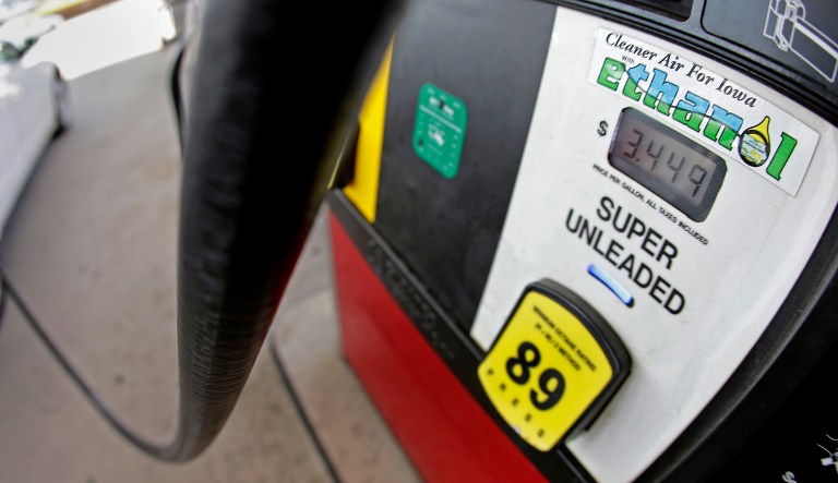 A motorist fills up with gasoline containing ethanol in Des Moines on July 26, 2013.