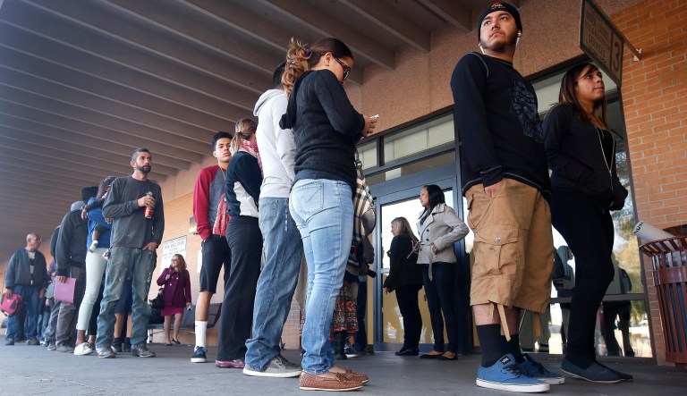 FPeople line outside of an Arizona Department of Transportation Motor Vehicle Division office. A single mother battling cancer and a victim of domestic abuse are among the immigrants who qualify for Arizona driver's licenses but have been illegally denied the chance to drive a car, a group of advocacy organizations said in a new federal lawsuit. Denying licenses to some immigrants in the country illegally who have been granted deferred action, or protection from deportation, is unconstitutional, according to the claim filed Monday, Sept. 12, 2016 by the Mexican American Legal Defense and Educational Fund, the National Immigration Law Center and the Ortega Law Firm.