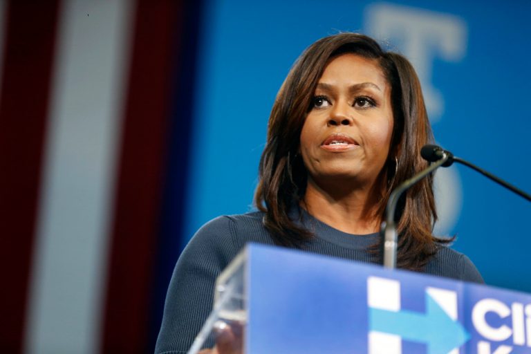 First lady Michelle Obama speaks during a campaign rally for Democratic presidential candidate Hillary Clinton Thursday, Oct. 13, 2016, in Manchester, N.H.
