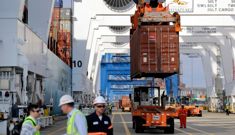 In this Oct. 24, 2016, photo, a container is unloaded from a ship at the Port of Baltimore in Baltimore.
