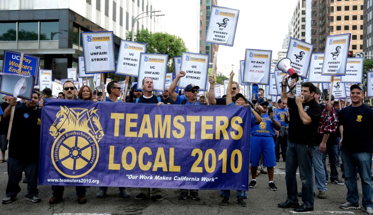 Several hundred Teamsters union members participate in a 2015 rally at the University of California Los Angeles. The Teamsters and other labor unions said Wednesday the Supreme Court's decision barring mandatory union fees at government agencies is likely to lead to long-lasting harm for workers at private companies.
