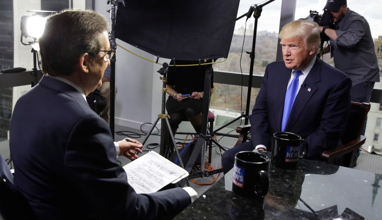 President-elect Donald Trump, right, is interviewed by Chris Wallace of "Fox News Sunday" at Trump Tower in New York, Saturday, Dec. 10, 2016.