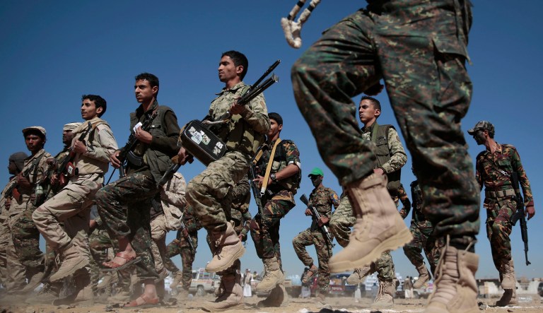 Newly recruited Shiite fighters, known as Houthis, march during a gathering aimed at mobilizing more fighters into battlefronts to fight pro-government forces in several Yemeni cities, in Sanaa, Yemen, Tuesday, Jan. 3, 2017.