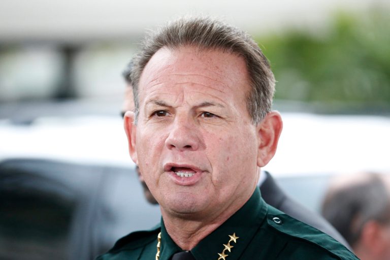 Broward County Sheriff Scott Israel speaks during a news conference at Fort LauderdaleâHollywood International Airport, Friday, Jan. 6, 2017, in Fort Lauderdale, Fla. A gunman opened fire in the baggage claim area at the airport Friday, killing several people and wounding others before being taken into custody in an attack that sent panicked passengers running out of the terminal and onto the tarmac, authorities said.