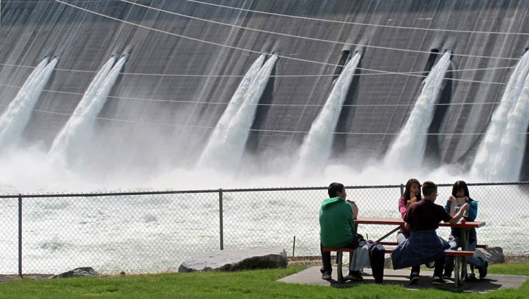 Water is released through the outlet tubes at Grand Coulee Dam, Wash.