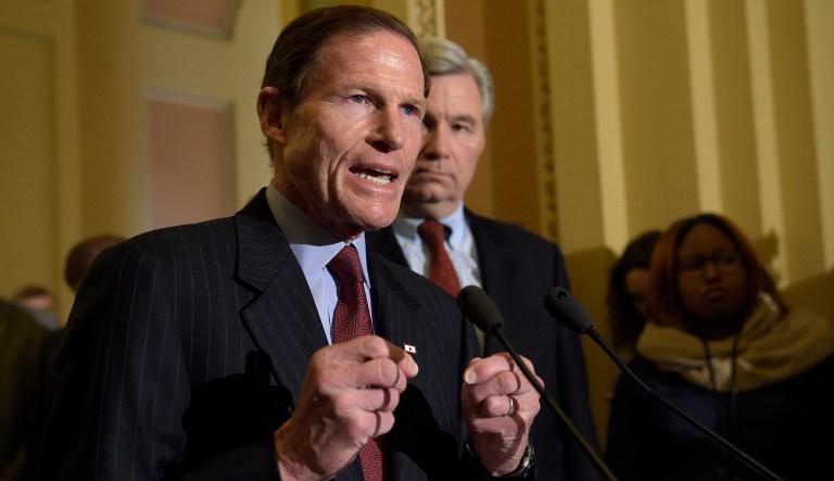 Sen. Richard Blumenthal, D-Conn., accompanied by Sen. Sheldon Whitehouse, D-R.I., speaks to reporters during a news conference on Capitol Hill in Washington on Feb. 7, 2017.
