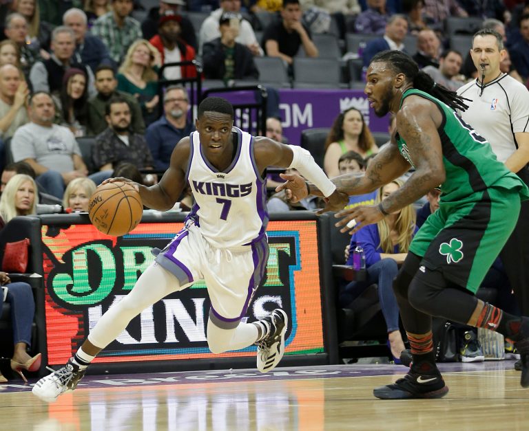 Sacramento Kings guard Darren Collison, left, drives past Boston Celtics forward Jae Crowder during the first quarter of an NBA basketball game, Wednesday, Feb. 8, 2017, in Sacramento, Calif. The Kings won 108-92.