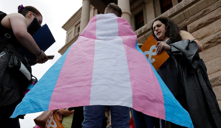 Members of the transgender community take part in a rally on the steps of the Texas Capitol, Monday, March 6, 2017, in Austin, Texas. The group is opposing a "bathroom bill" that would require people to use public bathrooms and restrooms that correspond with the sex on their birth certificate.