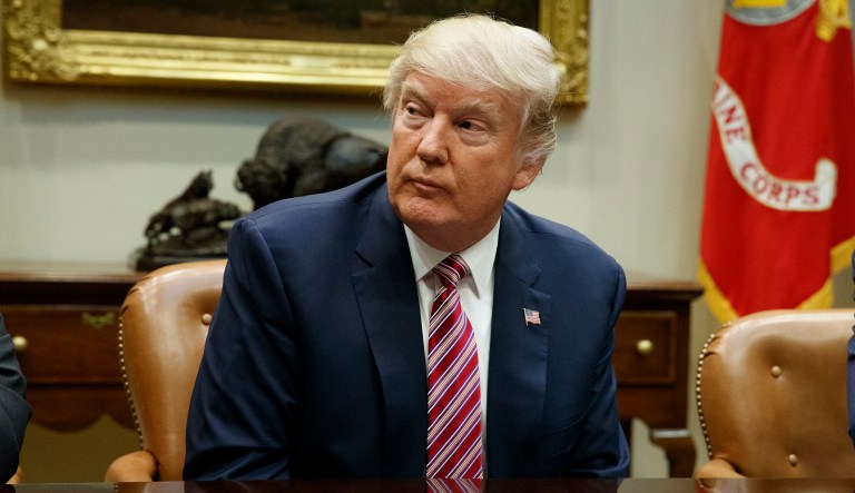 President Donald Trump listens during a meeting in the Roosevelt Room of the White House. (AP Photo/Evan Vucci)