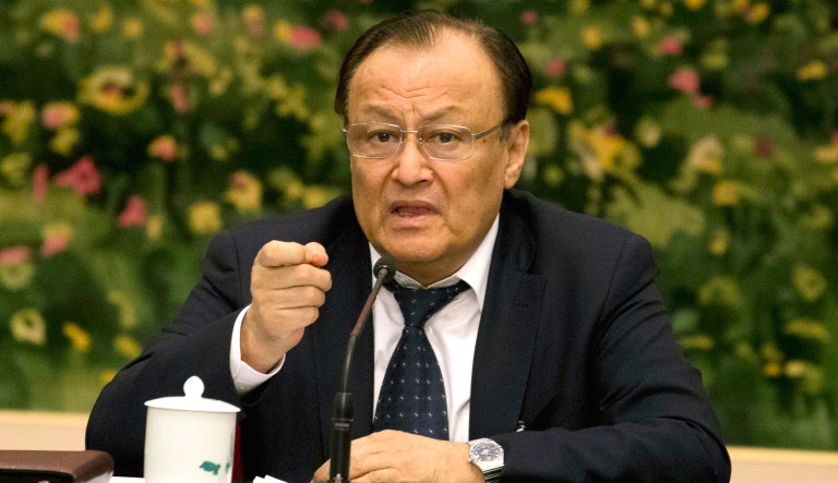 Shohrat Zakir speaks during a session of the National People's Congress in Beijing, China.