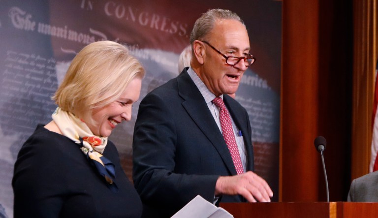 Senate Minority Leader Chuck Schumer of New York, center, accompanied by Sen. Kirsten Gillibrand, D-N.Y., left, speaks to reporters during a news conference about the Family Act, Tuesday, March 14, 2017, on Capitol Hill in Washington.