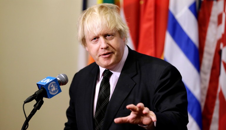 British Foreign Secretary Boris Johnson speaks to reporters.