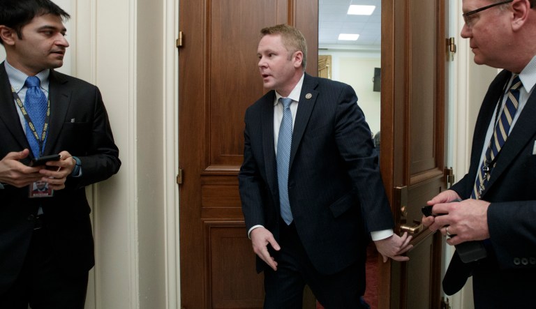 Rep. Warren Davidson (R-OH) leaves a meeting with the conservative House Freedom Caucus on Capitol Hill in Washington.