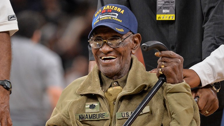Richard Overton, 110, leaves the court after a special presentation honoring him as the oldest living American war veteran.