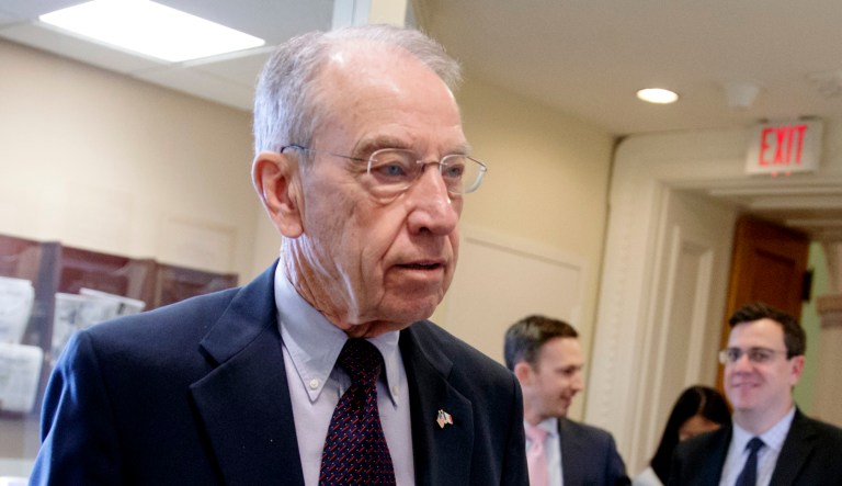Senate Judiciary Committee Chairman Chuck Grassley, R-Iowa, arrives for a news conference.