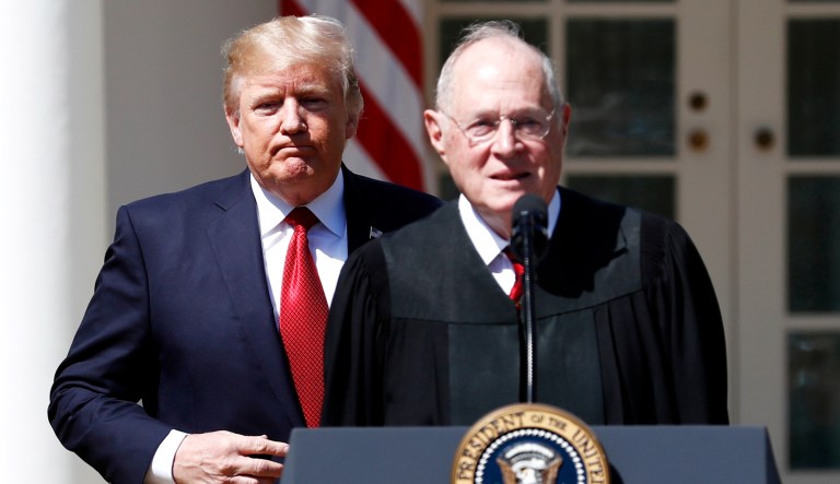 President Trump, left, and Supreme Court Justice Anthony Kennedy participate in an event at the White House.