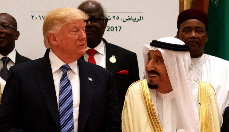President Trump talks with Saudi King Salman as they pose for photos with leaders at the Arab Islamic American Summit, at the King Abdulaziz Conference Center on May 21, 2017, in Riyadh, Saudi Arabia.