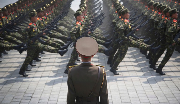 FILE - In this April 15, 2017, file photo, soldiers goose-step across Kim Il Sung Square in Pyongyang, North Korea, during a parade to celebrate the 105th birth anniversary of Kim Il Sung, the country's late founder and grandfather of current ruler Kim Jong Un. The message of the parade is clear: North Korea is, or is near to being, able to launch a pre-emptive strike against a regional target. It is preparing to withstand a retaliatory follow-up attack if it does, and it is building the arsenal it needs to then launch a second wave of strikes, this time at the U.S. mainland.