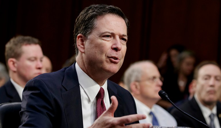Former FBI Director James Comey talks during a hearing in D.C.