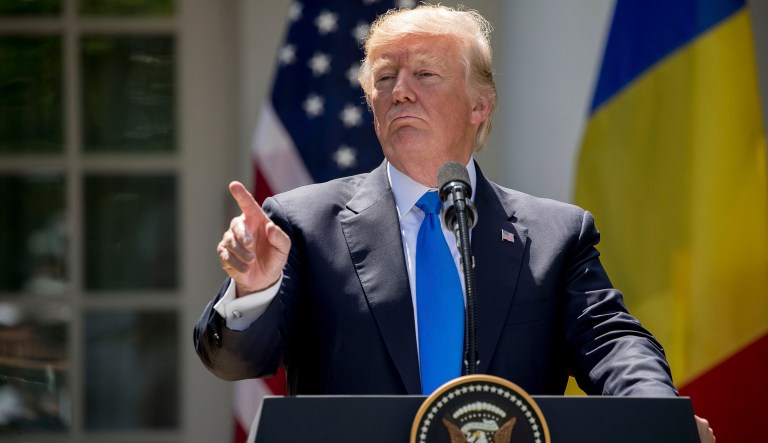 President Donald Trump gestures during a news conference with Romanian President Klaus Werner Iohannis in the Rose Garden at the White House, Friday, June 9, 2017, in Washington. 