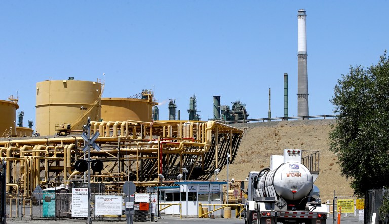 A truck drives into the Valero Benicia Refinery in Benicia, Calif.