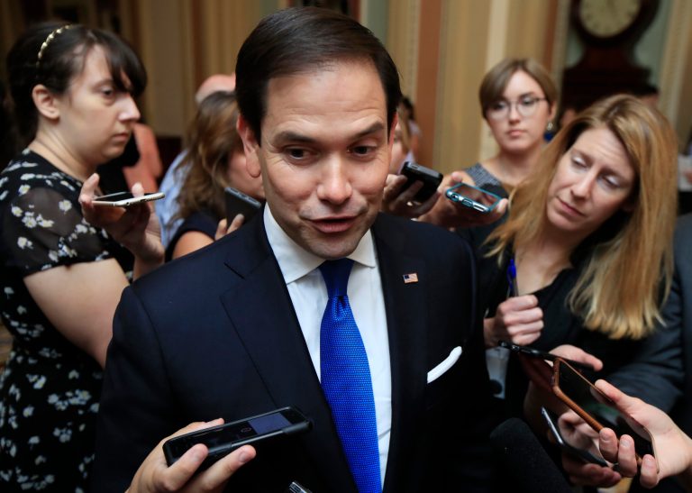 Sen. Marco Rubio, R-Fla. speaks to reporters as he walks toward the Senate floor on Capitol Hill in Washington, Tuesday, July 18, 2017.