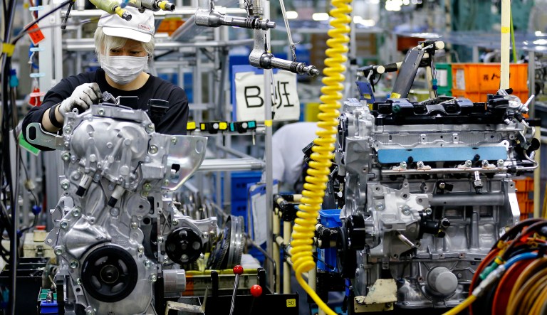 In this Aug. 2, 2017, photo, a Nissan Motor Co. factory worker checks an engine on an assembly line at its plant in Yokohama, near Tokyo. Aiming to get an edge on its rivals in an intensely competitive industry, Japanese automaker Nissan says itâs attempting to foster a corporate culture that will produce manufacturing innovations in leaps and bounds instead of steady incremental improvement. Its discussion of that effort is partly a swipe at bigger competitor Toyota Motor Corp. which for decades has favored the concept of âkaizenâ or fine tuning and bit-by-bit progress in auto manufacturing.