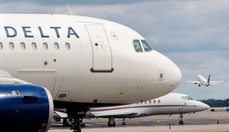 This Tuesday, Aug. 8, 2017, photo shows a Delta Air Lines airplane on the tarmac at LaGuardia Airport in the Queens borough of New York. Delta Air Lines, Inc. reports earnings Thursday, April 12, 2018.