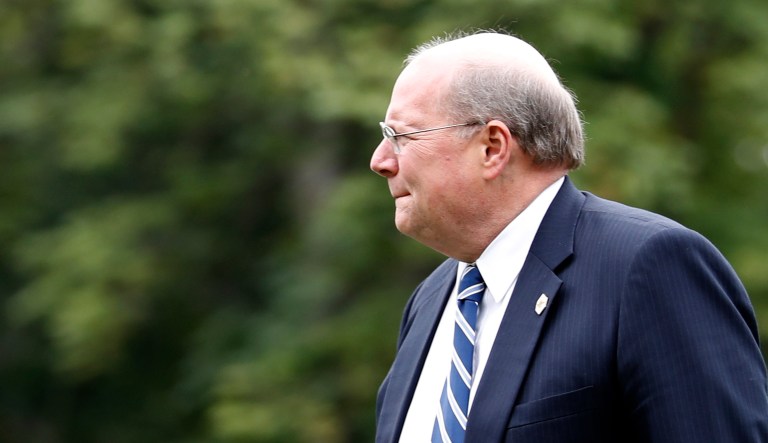 White House Deputy Chief of Staff for Operations Joe Hagin walks to the White House as he arrives on the South Lawn in Washington.