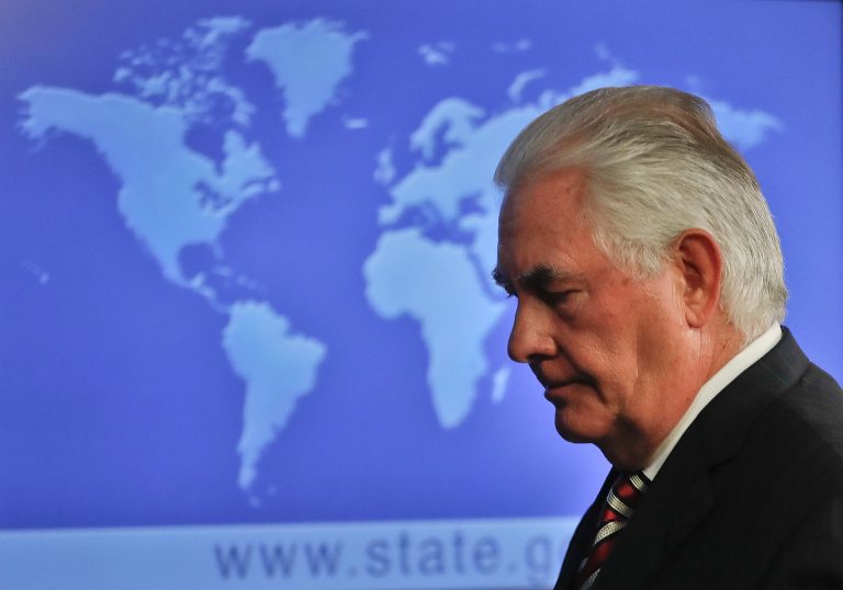 Outgoing Secretary of State Rex Tillerson leaves after speaking.