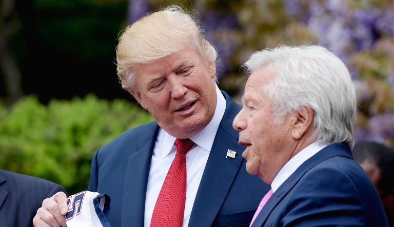 President Trump talks to Robert Kraft.