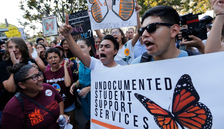 Undocumented students join a rally in support of the Deferred Action for Childhood Arrivals, or DACA program outside the Edward Roybal Federal Building in downtown Los Angeles Friday, Sept. 1, 2017. President Donald Trump says he'll be announcing a decision on the fate of hundreds of thousands of young immigrants who were brought into the country illegally as children in the coming days, immigrants he's calling "terrific" and says he loves. Trump told reporters Friday, using a short-hand term for the nearly 800,000 young people who were given a reprieve from deportation and temporary work permits under the Obama-era DACA, program.