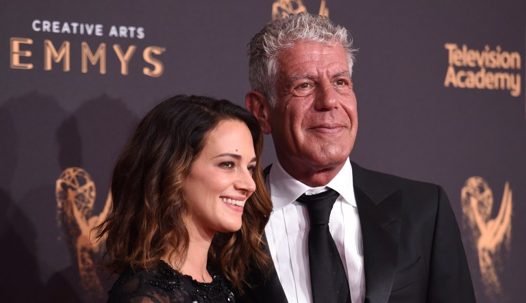 Actress Asia Argento and chef and TV personality Anthony Bourdain, her boyfriend, arrive at night one of the Creative Arts Emmy Awards at the Microsoft Theater on Sept. 9, 2017, in Los Angeles.