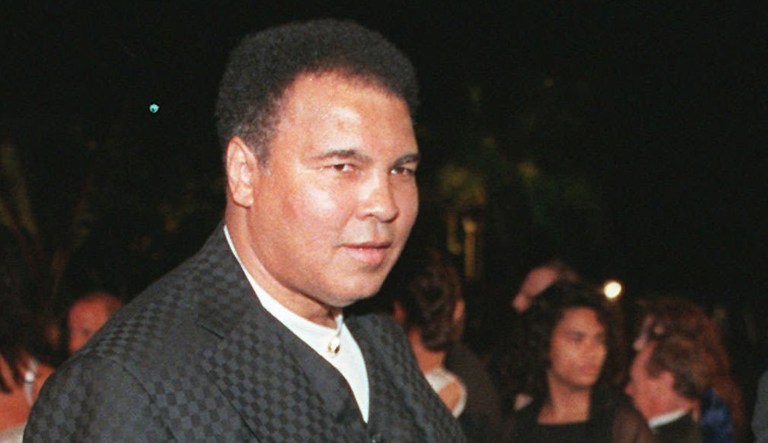 Boxing great Muhammad Ali arrives at a Vanity Fair Oscar party in West Hollywood, Calif. 