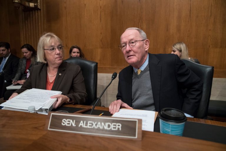 Sen. Patty Murray, D-Wash., the ranking member, and Sen. Lamar Alexander, R-Tenn., chairman of the Senate Health, Education, Labor, and Pensions Committee, meet before the start of a hearing on Capitol Hill in Washington.