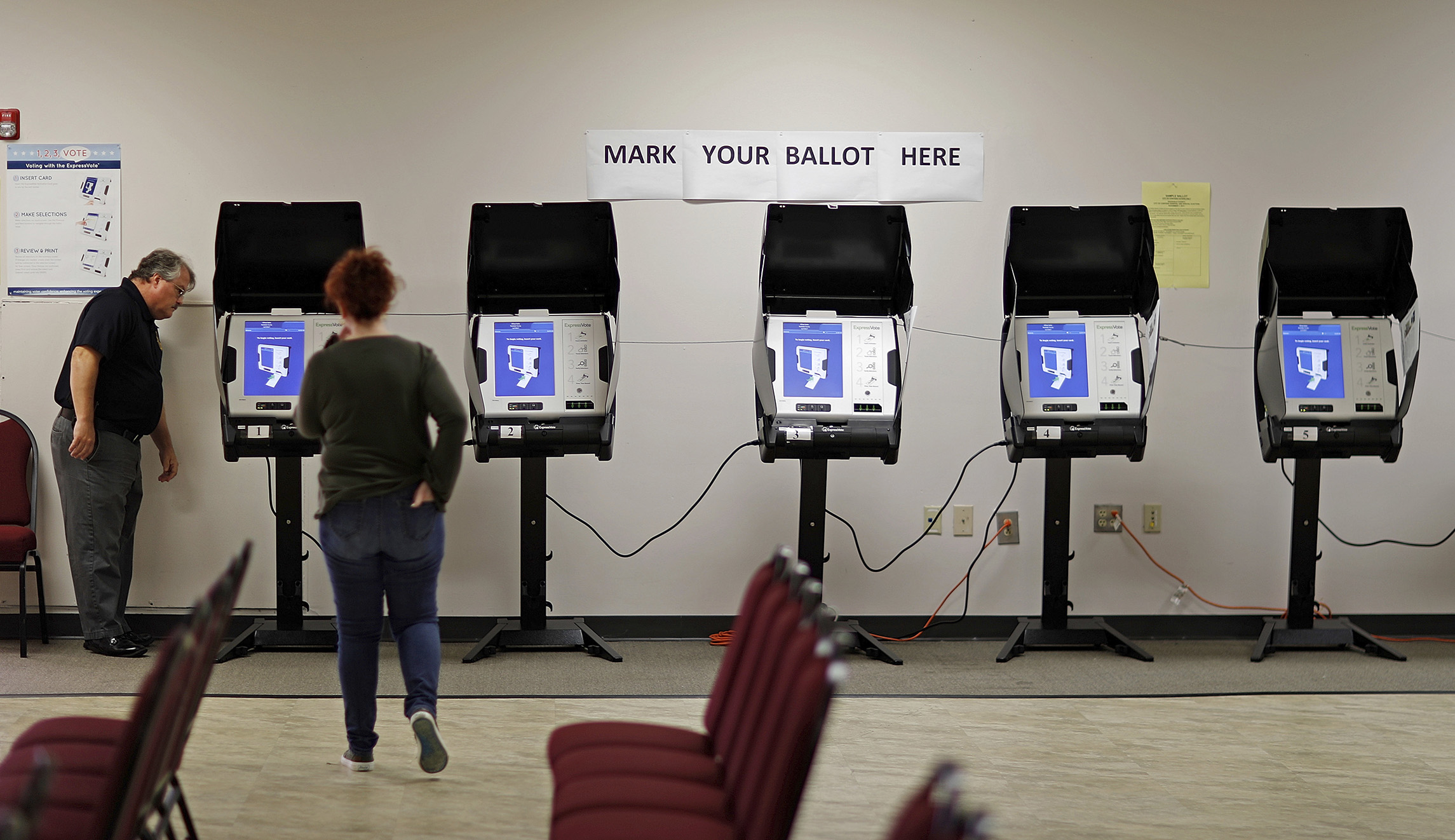 Georgia election workers settle with One America News in defamation lawsuit