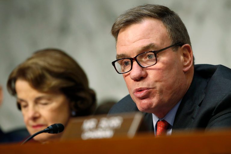 Senate Intelligence Committee Vice Chairman Sen. Mark Warner, D-Va., right, speaks during a Senate Intelligence Committee hearing.