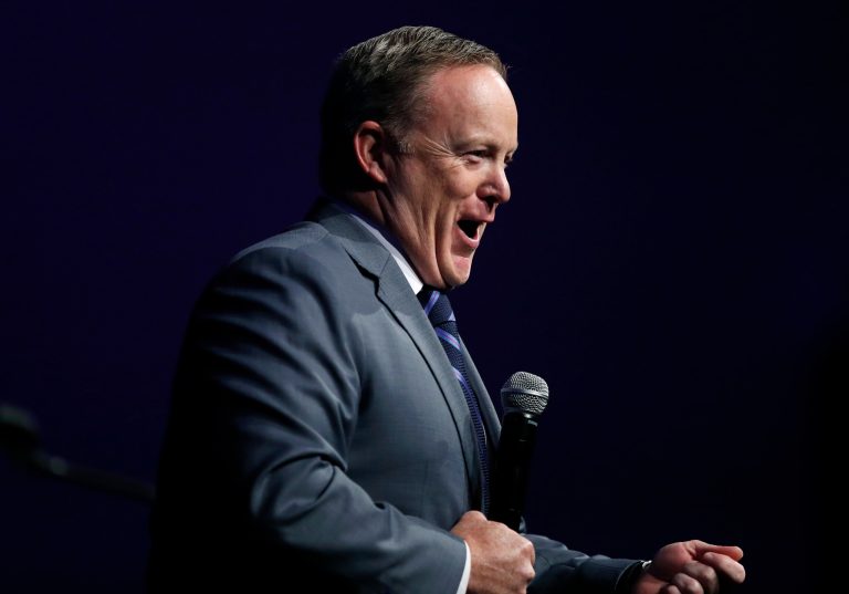 Former White House press secretary Sean Spicer speaks during the Republican Party of Iowa's annual Reagan Dinner, Wednesday, Nov. 8, 2017, in Des Moines, Iowa. His book, The Briefing, is released this month.