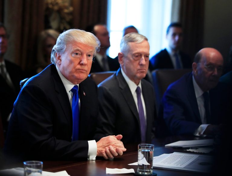 President Trump (pictured left) sits with Secretary of Defense Jim Mattis (pictured center) and Secretary of Commerce Wilbur Ross during a cabinet meeting in the White House.