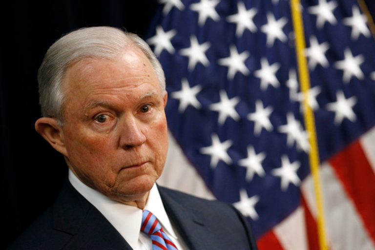 Attorney General Jeff Sessions listens to a reporter's question during a news conference in Baltimore, Tuesday, Dec. 12, 2017, to announce efforts to combat the MS-13 street gang with law enforcement and immigration actions.