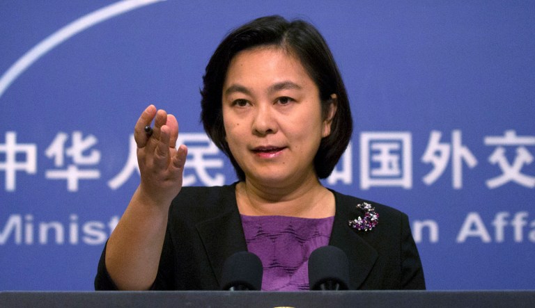Chinese foreign ministry spokeswoman Hua Chunying gestures during a press briefing at the Ministry of Foreign Affairs building in Beijing.