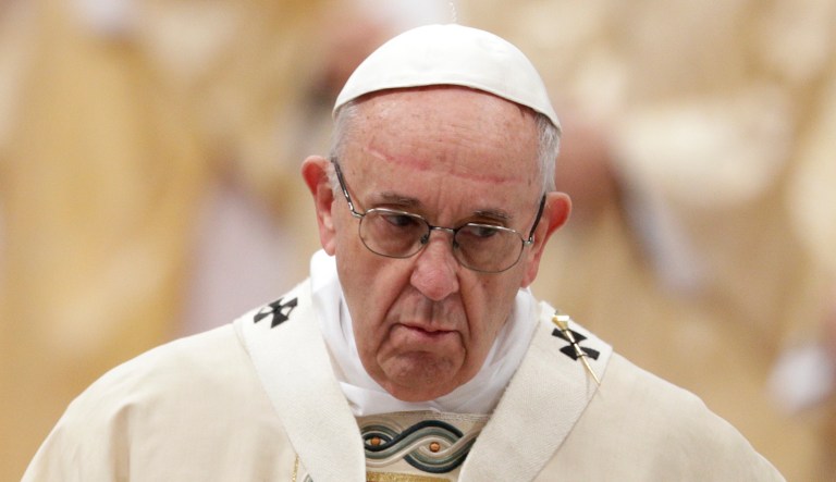 Pope Francis arrives to celebrate a Mass in St. Peter's Basilica at the Vatican.