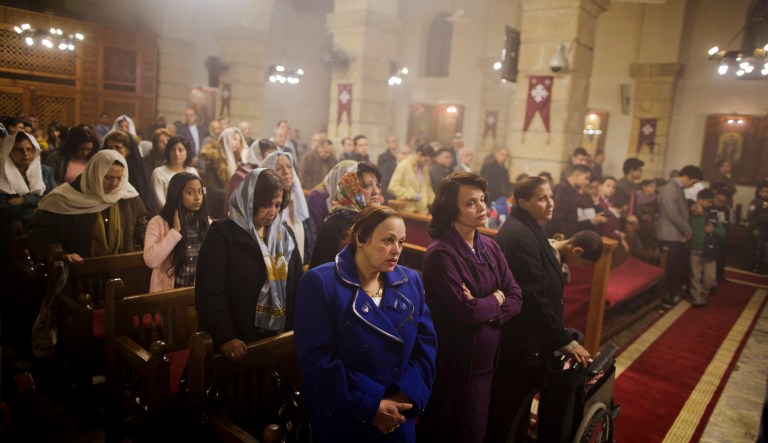 Coptic Christians pray during Christmas Eve Mass at the Virgin Mary church, in Cairo, Egypt, late Saturday, Jan. 6, 2018. The Coptic Christian population are considered to be the largest Christian community in the Middle East and observe Christmas on January 7 according to the old, Julian calendar. 