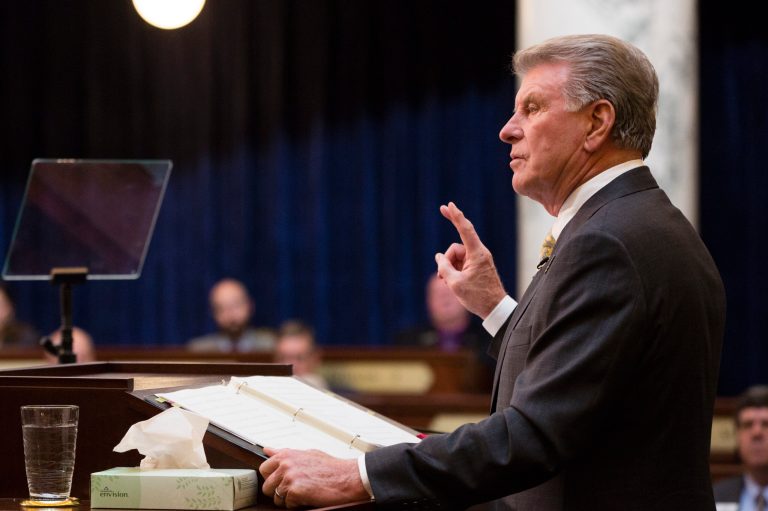 Idaho Gov. C.L. "Butch" Otter delivers an address inside the house chambers at the state Capitol building, in Boise, Idaho.