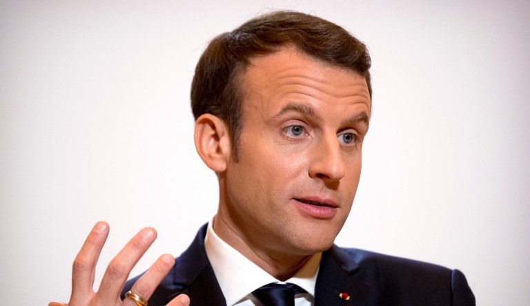 French President Emmanuel Macron speaks at a press conference.
