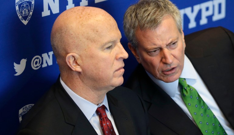 New York City Mayor Bill de Blasio, right, talks with New York City Police Commissioner James O'Neill at a plaque dedication ceremony at the Central Park police precinct in New York, Wednesday, Jan. 10, 2018.