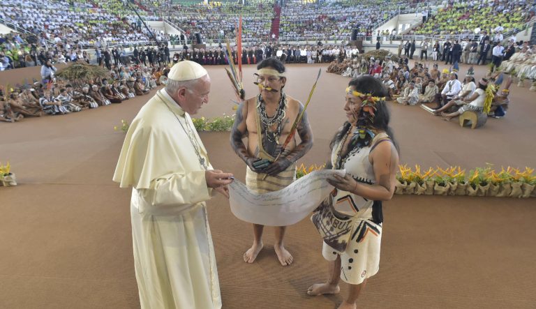 Pope Francis arrives in a coliseum in Puerto Maldonado, the city considered a gateway to the Amazon in the Madre de Dios province, Peru, to meet with several thousand indigenous people in the first full day of the pontiff's visit to Peru, Friday, Jan. 19, 2018.  