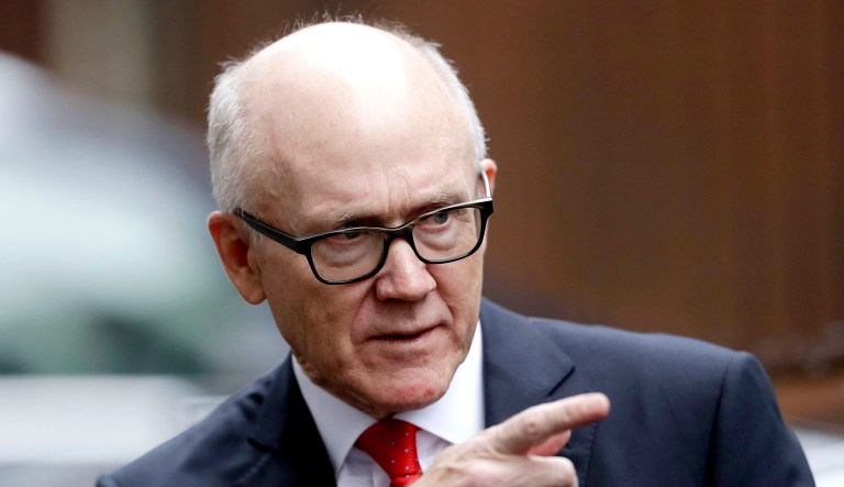 U.S. Ambassador to Britain Woody Johnson leaves from a meeting at 10 Downing Street in London.