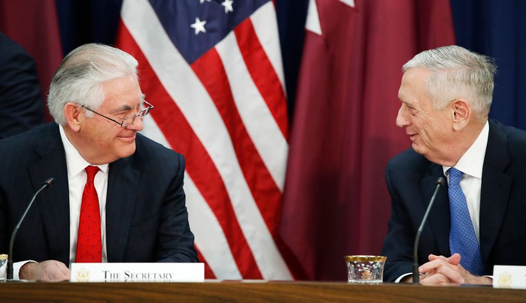 Then-Secretary of State Rex Tillerson, left, and Defense Secretary James Mattis smile during the U.S. Qatar Strategic Dialogue at the State Department in Washington.