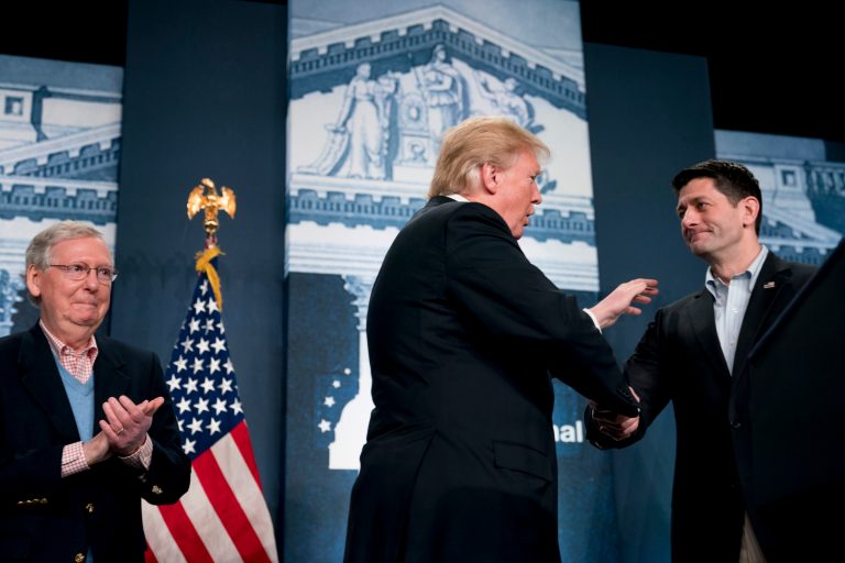 Senate Majority Leader Mitch McConnell of Ky., left, watches as President Donald Trump, center, greets House Speaker Paul Ryan of Wis., right, as he arrives to speak at the 2018 House and Senate Republican Member Conference at The Greenbrier, in White Sulphur Springs, W.Va., Thursday, Feb. 1, 2018. The three worked to break 20 years of gridlock on appropriations bills.